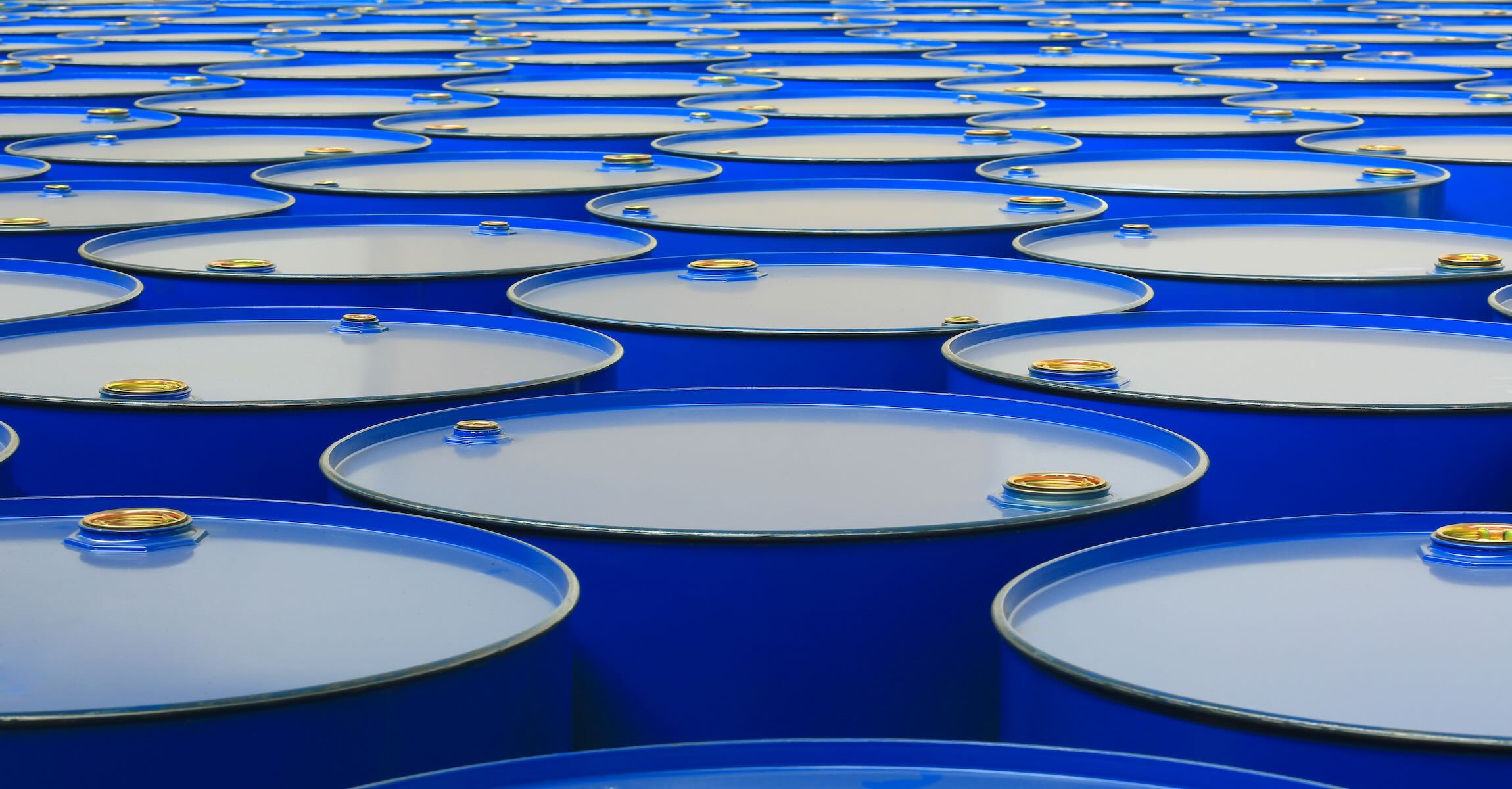 Oil barrels representing oil volatility and its impact on foodservice operations, labeling workflows, and operational resilience.